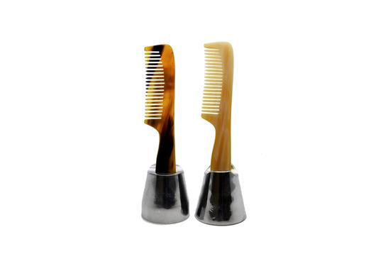 Two St James Shaving Emporium real horn beard and moustache combs in a stand