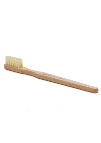 Toothbrush with natural bristles and wooden handle
