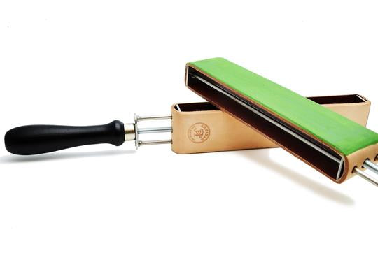Tension mounted adjustable strop with untreated and green pasted leather